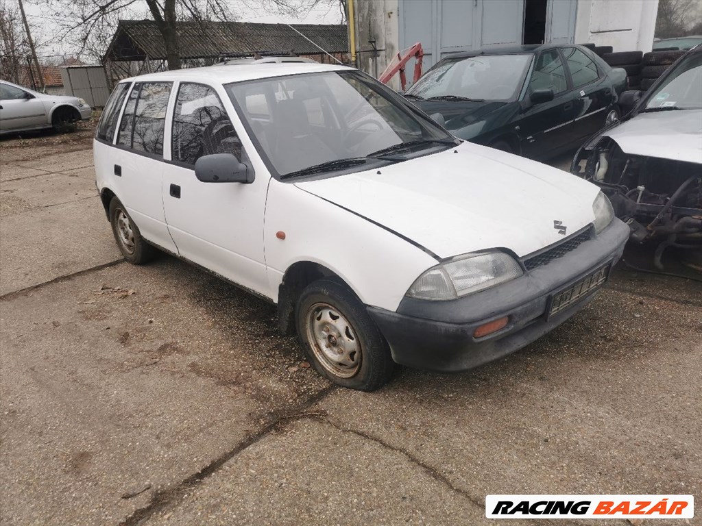 Suzuki Swift II 1.0 GL ELSŐ lökhárító  1. kép