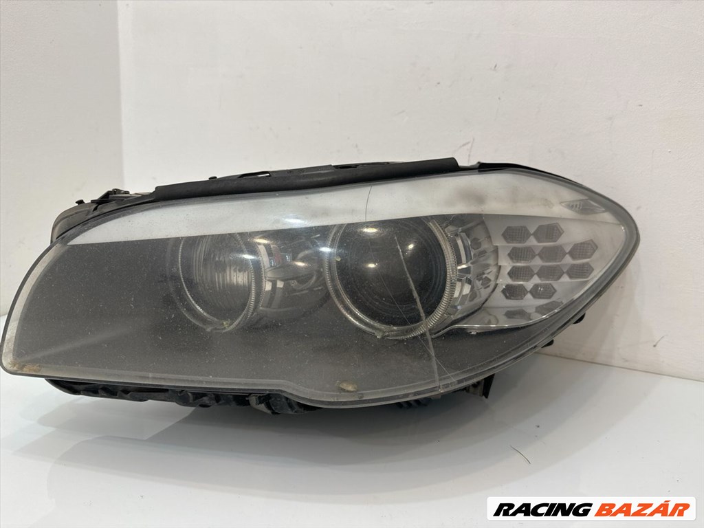 BMW F10 F11 bal oldali xenon kanyarkövetős fényszóró 720325118 1. kép
