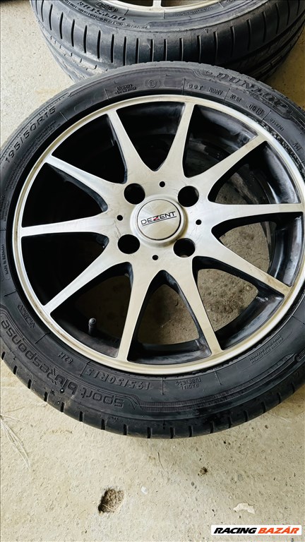 Ford Fiesta 4x108 lyukosztású 15" használt Dezent alufelni, rajta 195/50 újszerű Dunlop nyári gumi  2. kép