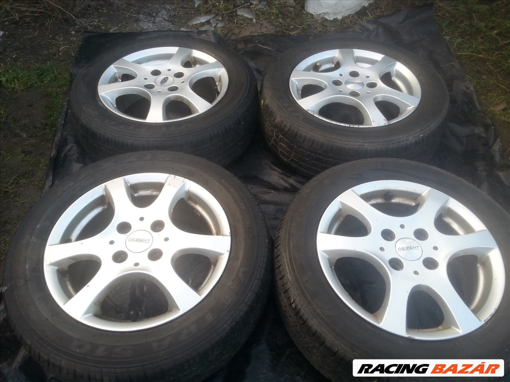  4x108 lyukosztású 15" gyári Ford alufelni, rajta 195/60 Maxxis nyári gumi  5. kép