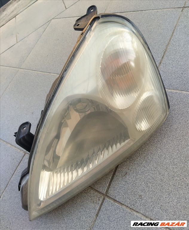 Suzuki Liana fényszóró bal 1. kép