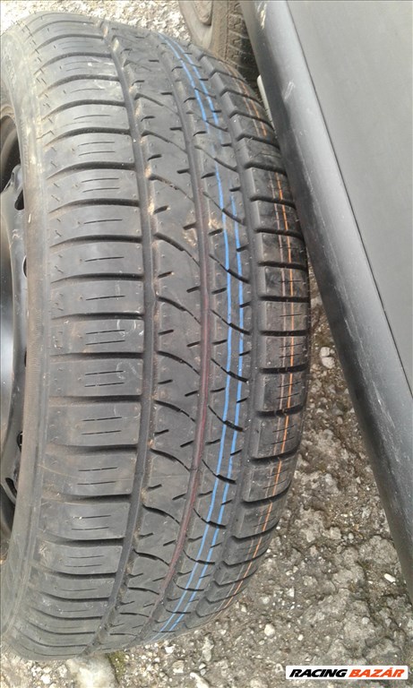  5x100 lyukosztású 15" új (gyári felni) lemezfelni, rajta 195/55 új Firestone nyári gumi gumi  2. kép