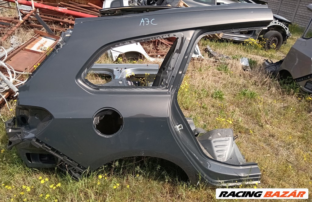 Opel Astra J kombihoz jobb hátsó sárvédő 1. kép