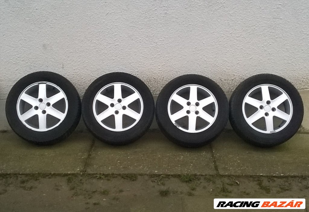 Eladó 4db 15-ös 4x100 Suzuki,Toyota,Mazda,stb alufelni 185/65R15 Michelin nyári gumival  1. kép