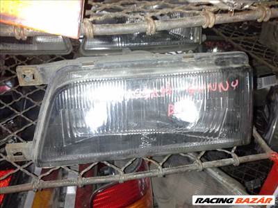 Nissan Sunny III Fényszóró Bal "001574"