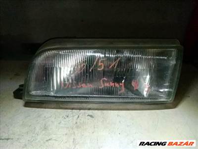 Nissan Sunny III Fényszóró Bal "050091"