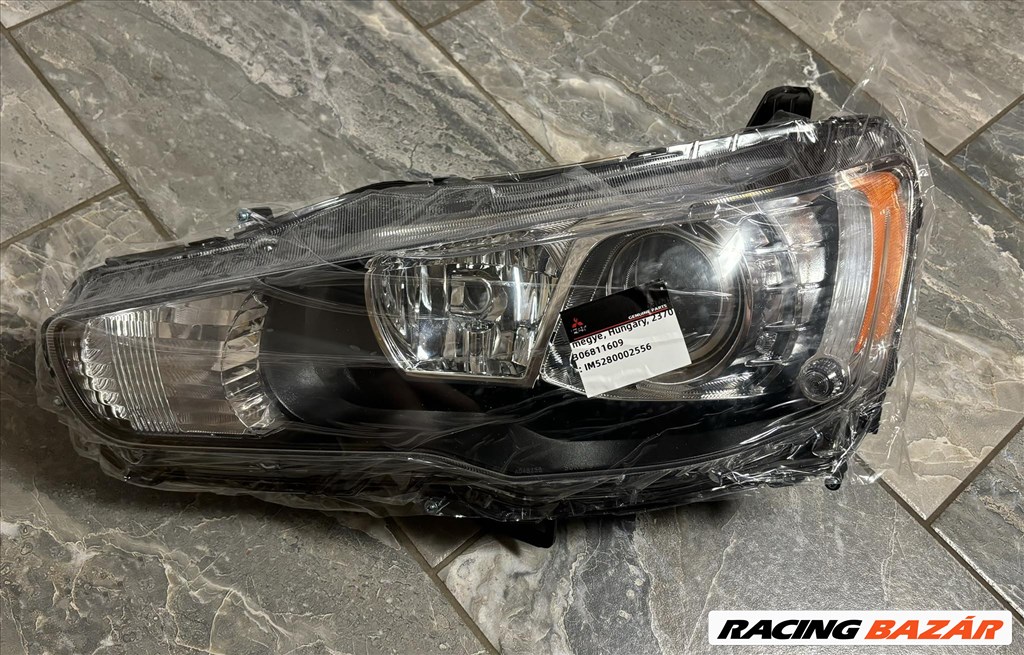 Mitsubishi Lancer VIII (2008-2017) gyári új bal első xenon fényszóró 8301C3-47 1. kép