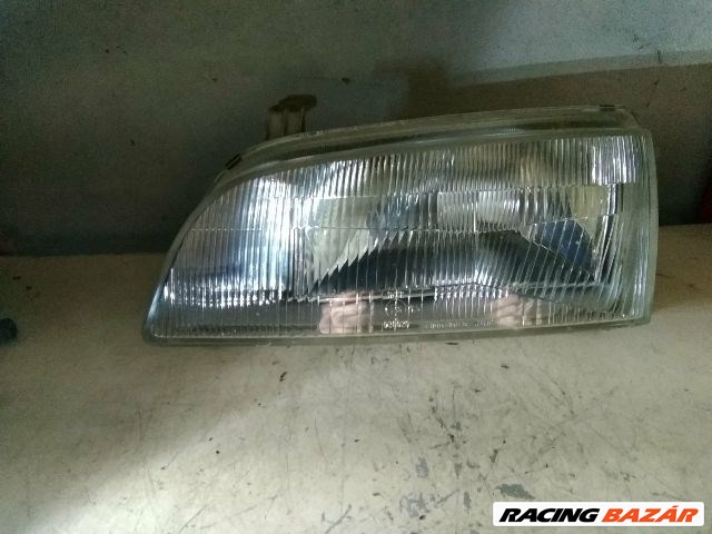 Suzuki Swift II Fényszóró Bal "051125" 1. kép