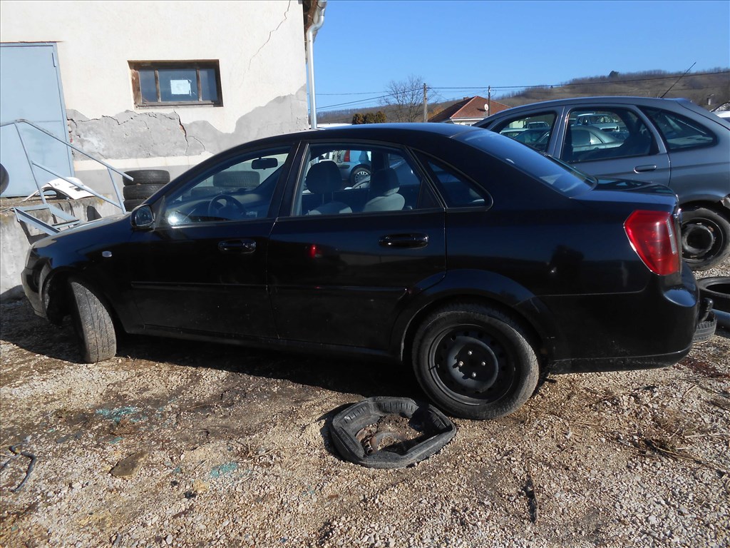 CHEVROLET LACETTI LÉPCSŐS HÁTÚ (J200) 1.4 bal hátsó ajtóhatároló 2. kép