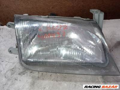 Suzuki Swift II Fényszóró Bal "122470"