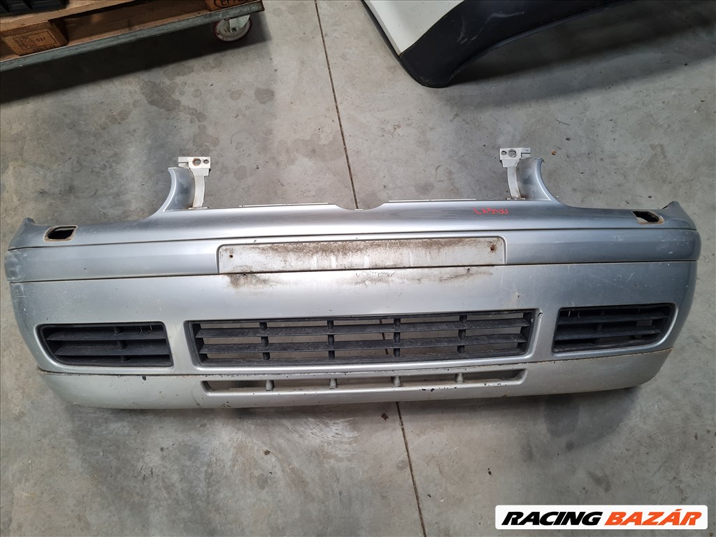Volkswagen Golf IV első lökhárító, lámpamosós LA7W 1. kép