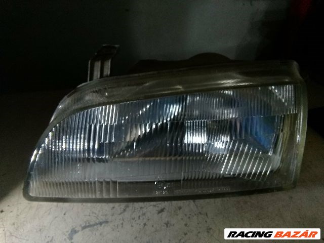 Suzuki Swift II Fényszóró Bal "058310" 1. kép