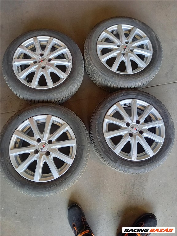 Platin 6x15 4x100 Smart alufelni 2 széles téligumikkal szenzorokkal. sxx1 1. kép