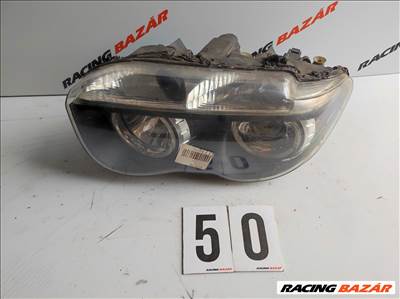 BMW 7-es sorozat E65/E66 bal első fényszóró , sérült