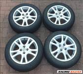  4db 4x100 lyukosztású 16" használt Mazda gyári alufelni, rajta 195/55 95%os Fulda téli gumi