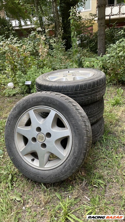  4x108 lyukosztású 15" használt alufelni, rajta 195/60 használt Dunlop nyári gumi 1. kép