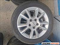  Opel 5x110 lyukosztású 16Jx16 használt ET44 gyári alufelni, 205/50 használt Falken nyári gumi