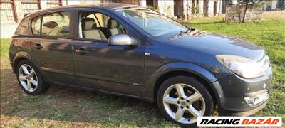 Opel Astra H jobb első sárvédő Z4XU szürkés kék