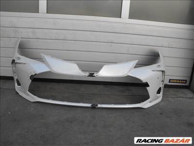 5021. Toyota Corolla E210 első lökhárító  5211902q10