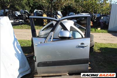 Suzuki SX4 2006 bal első ajtó komplett (1531) 