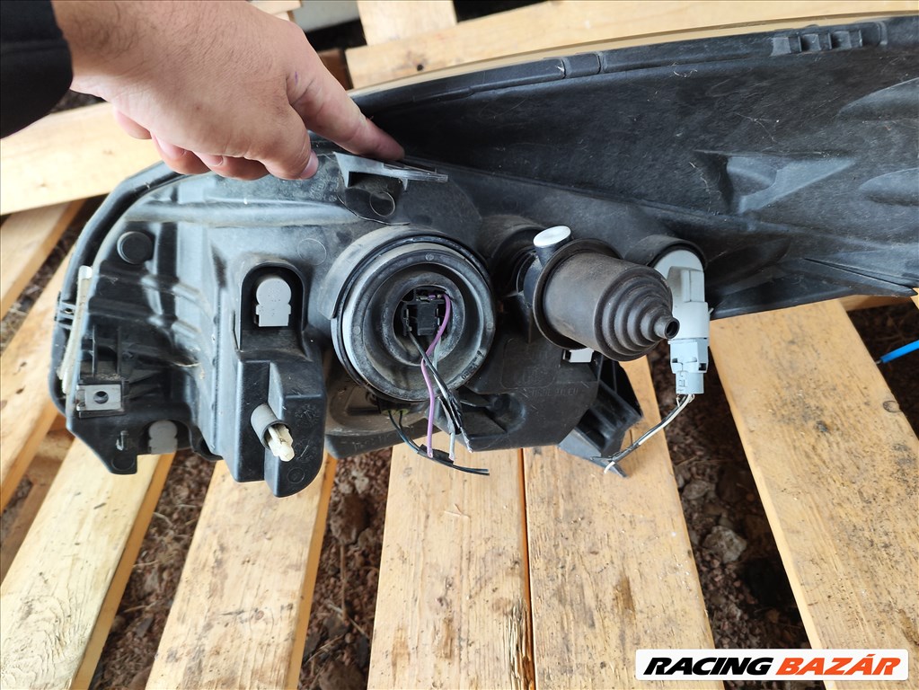 Dacia Sandero I jobb első fényszóró lámpa fülsérült 260104793r 9. kép