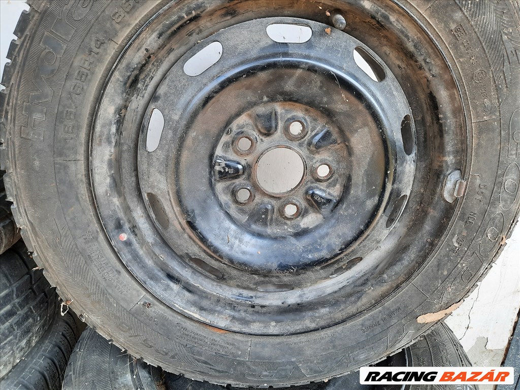 Toyota Carina E 5x100 lyukosztású 14"  lemezfelni, rajta 185/65 kopott nyári gumi  2. kép