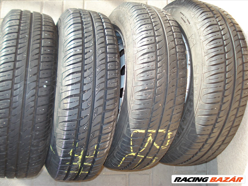  4x100 lyukosztású 13" használt lemezfelni, rajta 165/70 használt Semperit nyári gumi gumi  7. kép