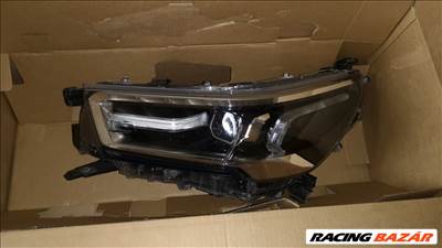Toyota Hilux (AN120/AN130) Újszerű bal fényszóró 81110-0KP41