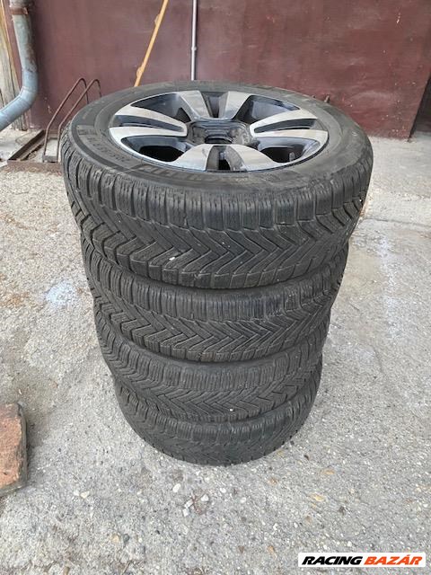  4x114.3 lyukosztású 16" használt Gyári alufelni, rajta 205/55 használt Michelin téli gumi gumi  3. kép