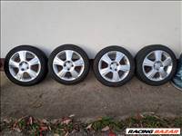  15" használt Opel (gyári felni) alufelni 4x100 56.6mm et 49