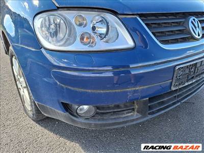 Volkswagen Touran I Lámpa mosós első lökhárító