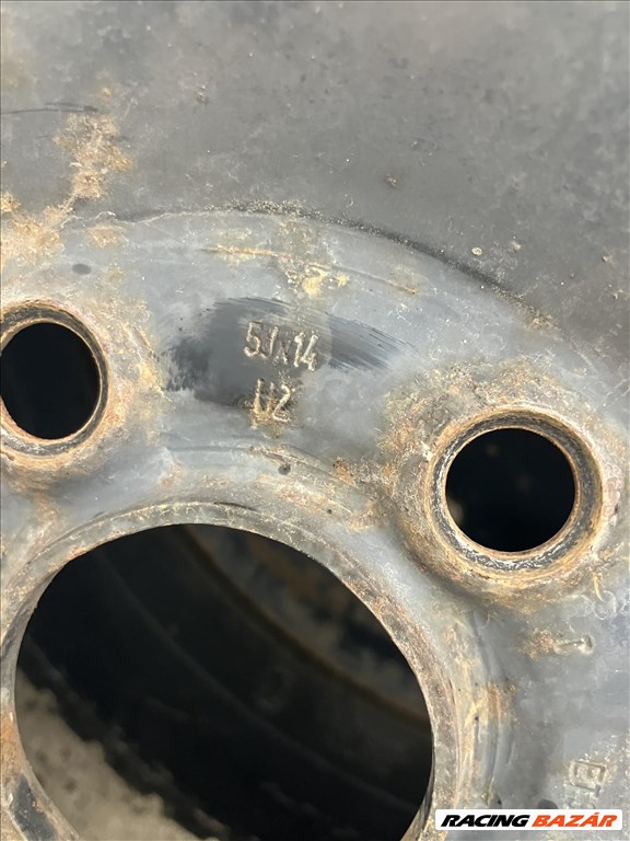  5x100 lyukosztású 14". coll 175/65 újszerű téli gumi lemezfelnin  2. kép