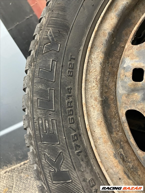  5x100 lyukosztású 14". coll 175/65 újszerű téli gumi lemezfelnin  5. kép