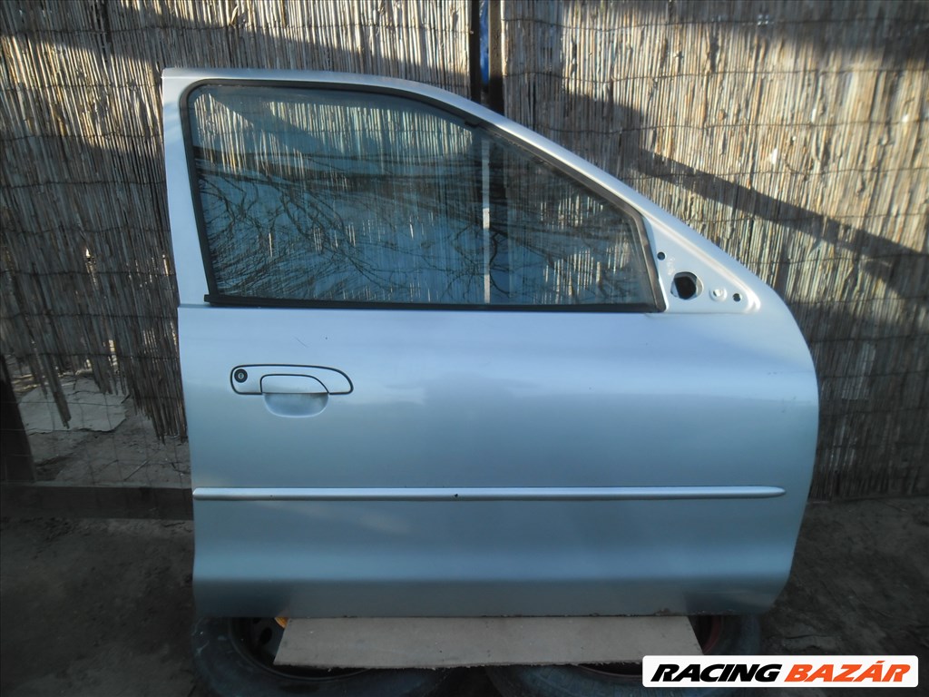 Ford Mondeo Mk2 jobb első ajtó  1. kép