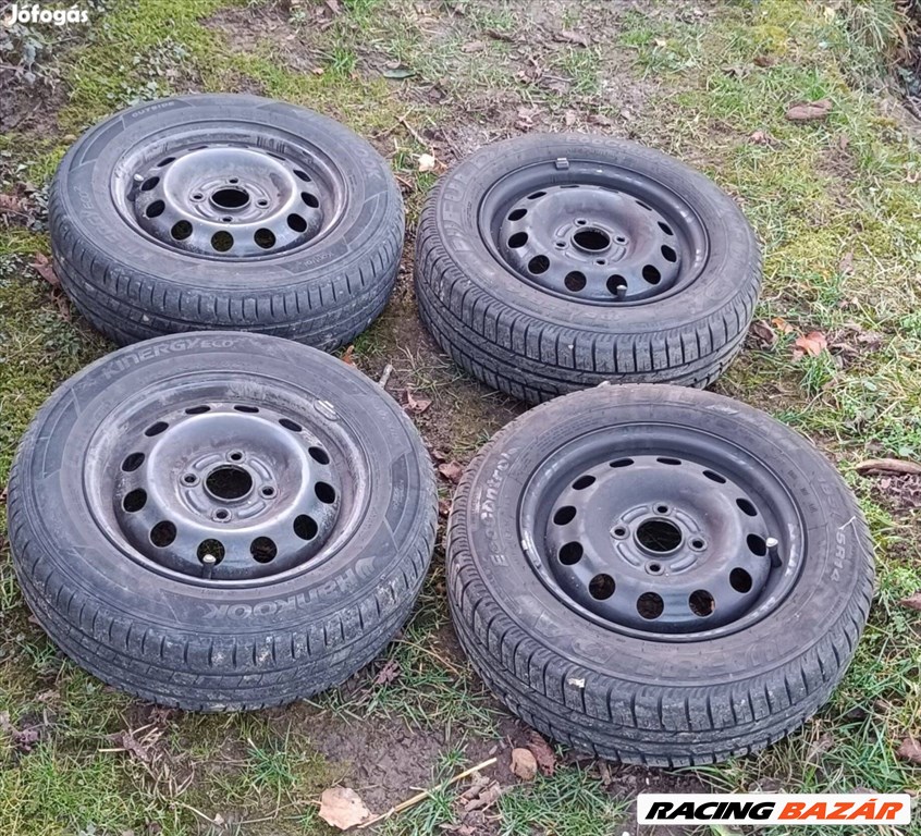  4x108 lyukosztású 14" használt (gyári felni) lemezfelni, rajta 185/65 használt nyári gumi gumi  1. kép