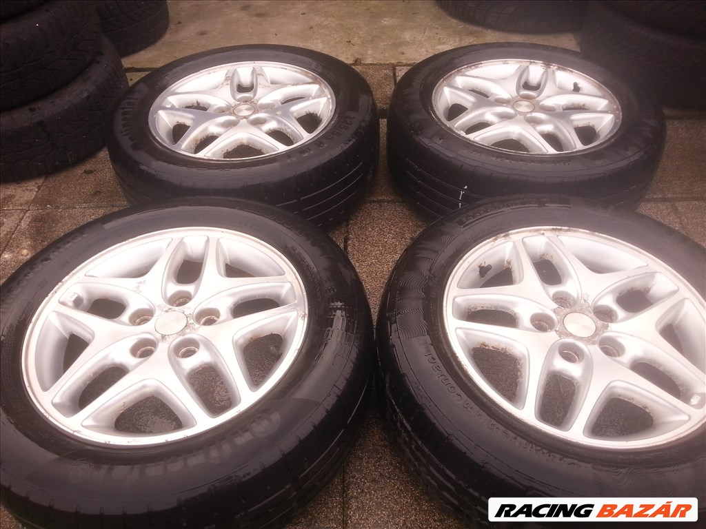  5x114.3 lyukosztású 16" Chrysler alufelni, rajta 225/55R16 Continental nyári gumi  1. kép