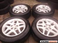  5x114.3 lyukosztású 16" Chrysler alufelni, rajta 225/55R16 Continental nyári gumi 