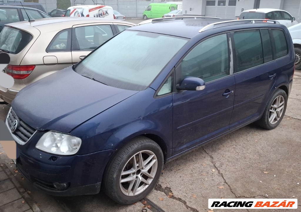 Volkswagen Touran I (Typ 1T) bontott alkatrészei 2.0pd BKD DSG  XENON 1. kép