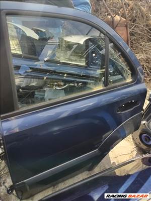 Kia Sorento (JC) Ajtó hátsó bal oldali 