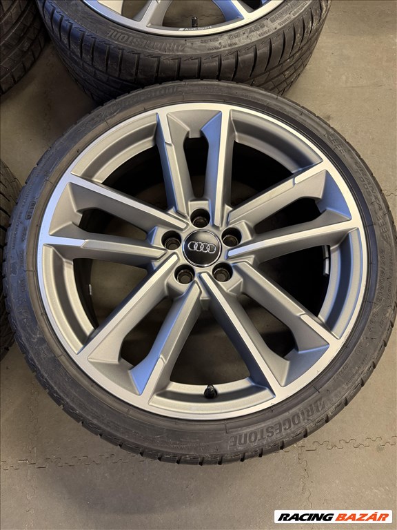  5x100 lyukosztású 18" újszerű (gyári felni) alufelni, rajta 215/40 újszerű Bridgestone nyári gumi 2. kép