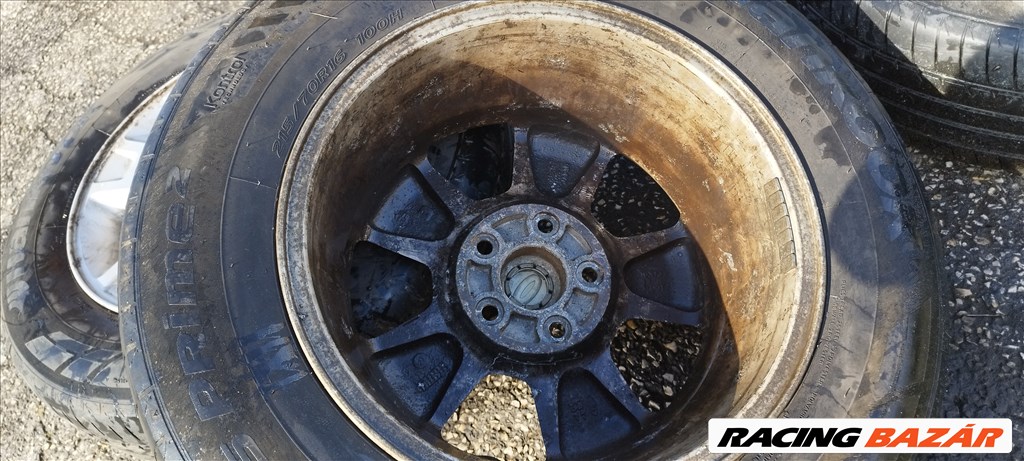  5x114.3 lyukosztású 16" Ford Maverick gyári alufelni, 215/70 Hankook nyári gumival eladó! 5l84-1007 7. kép