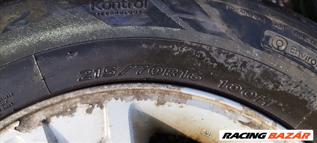  5x114.3 lyukosztású 16" Ford Maverick gyári alufelni, 215/70 Hankook nyári gumival eladó! 5l84-1007 10. kép
