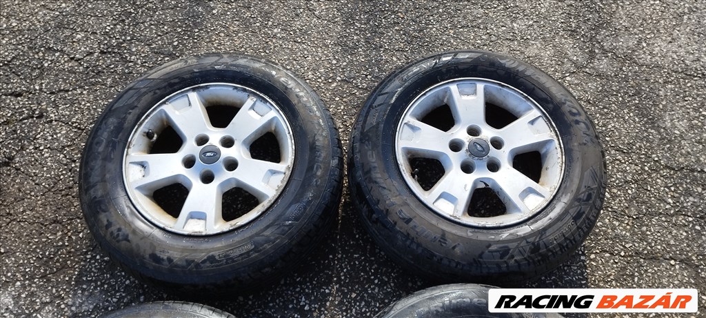  5x114.3 lyukosztású 16" Ford Maverick gyári alufelni, 215/70 Hankook nyári gumival eladó! 5l84-1007 3. kép