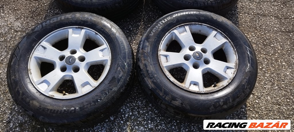  5x114.3 lyukosztású 16" Ford Maverick gyári alufelni, 215/70 Hankook nyári gumival eladó! 5l84-1007 2. kép