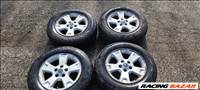  5x114.3 lyukosztású 16" Ford Maverick gyári alufelni, 215/70 Hankook nyári gumival eladó! 5l84-1007