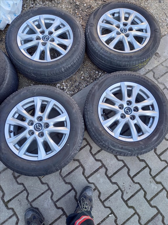  Mazda 3 5x114.3-as 6x16" újszerű (gyári felni) alufelni, 205/60 használt Firestone nyári gumi sxx3 1. kép