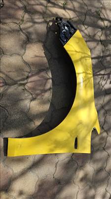 Opel Astra J Bal első sárvédő 