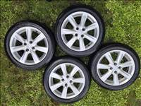 Honda gyári 4x100 lyukosztású 16" használt alufelni, rajta 185/55 használt Kumho négyévszakos gumi!