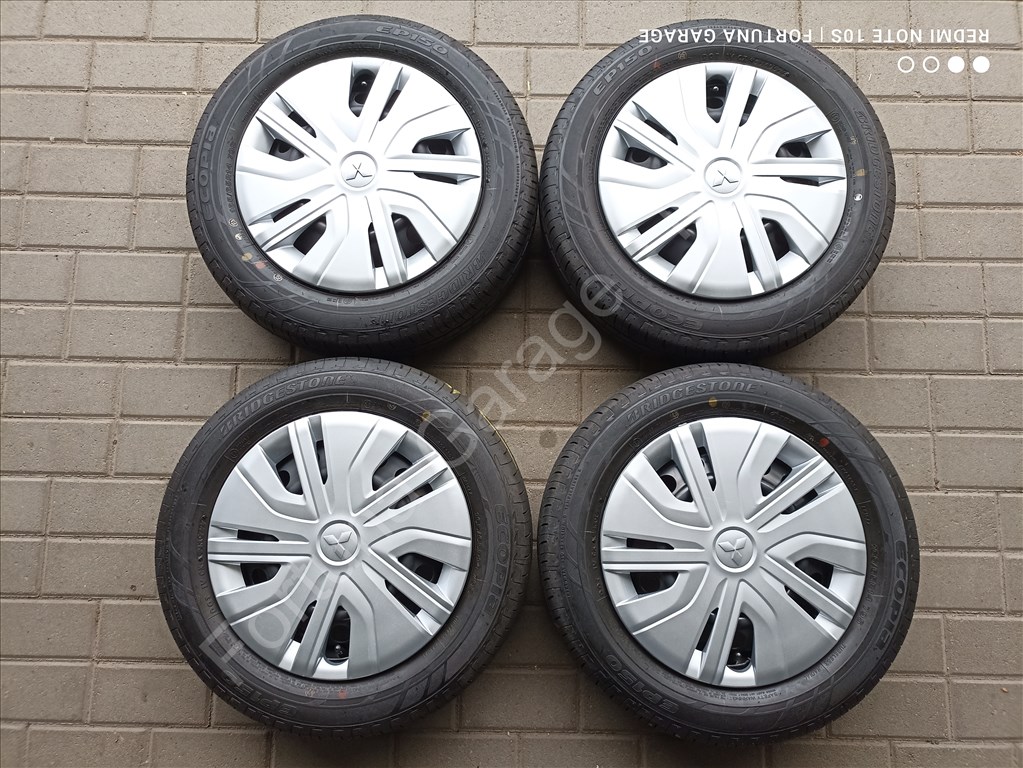 4x100 14" Mitsubishi újszerű nyári kerékgarnitúra +TPMS 1. kép