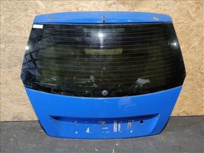 157559 Fiat Stilo 3 ajtós kék színű csomagtérajtó, a képen látható sérüléssel 46751763